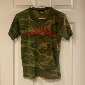 Boy’s Camo Shirt. Saying “I’m hiding from my sister. Size L